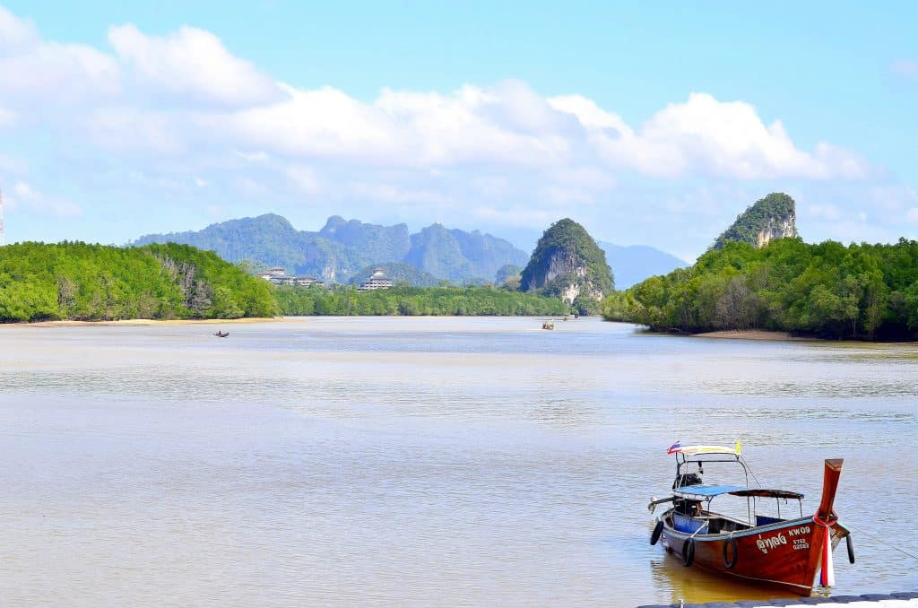 Khao Kanab Nam Mountains, located along the mangroves of the Krabi River that flows through Krabi Town.